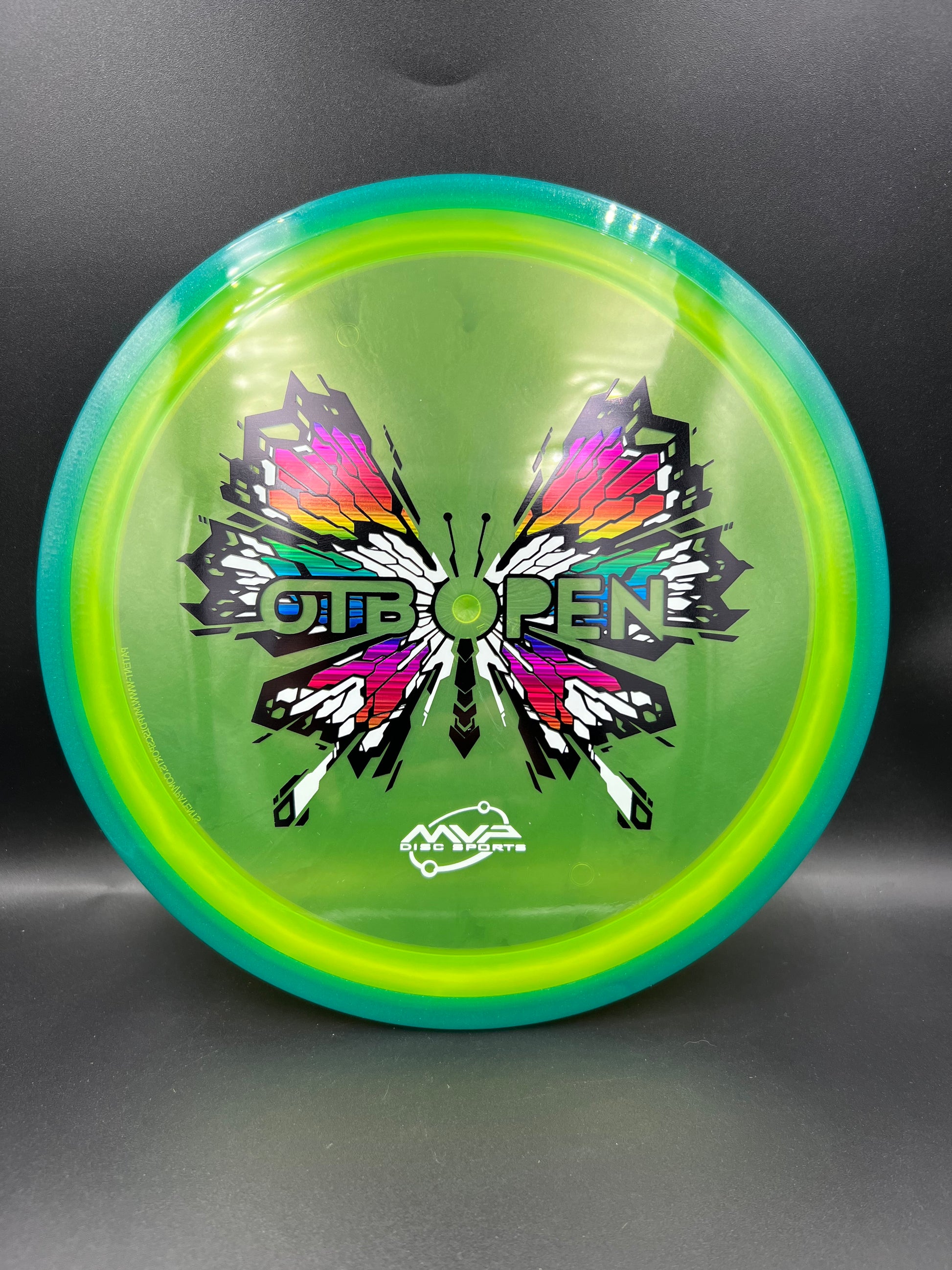 2026 OTB Axiom Prism Proton Soft Insanity Blue Rim Yellow Plate - 157g