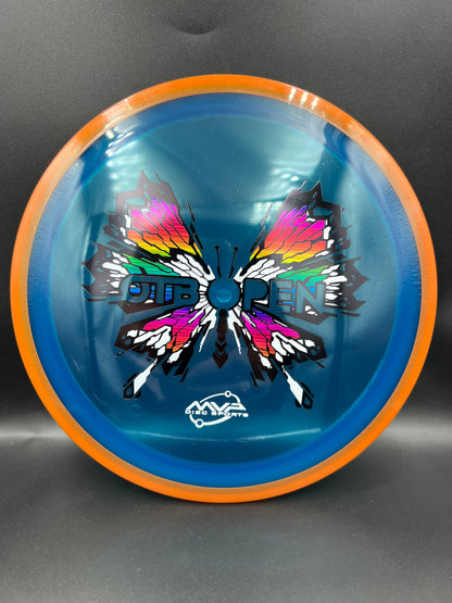 2026 OTB Axiom Prism Proton Soft Insanity Orange Rim Blue Plate - 159g