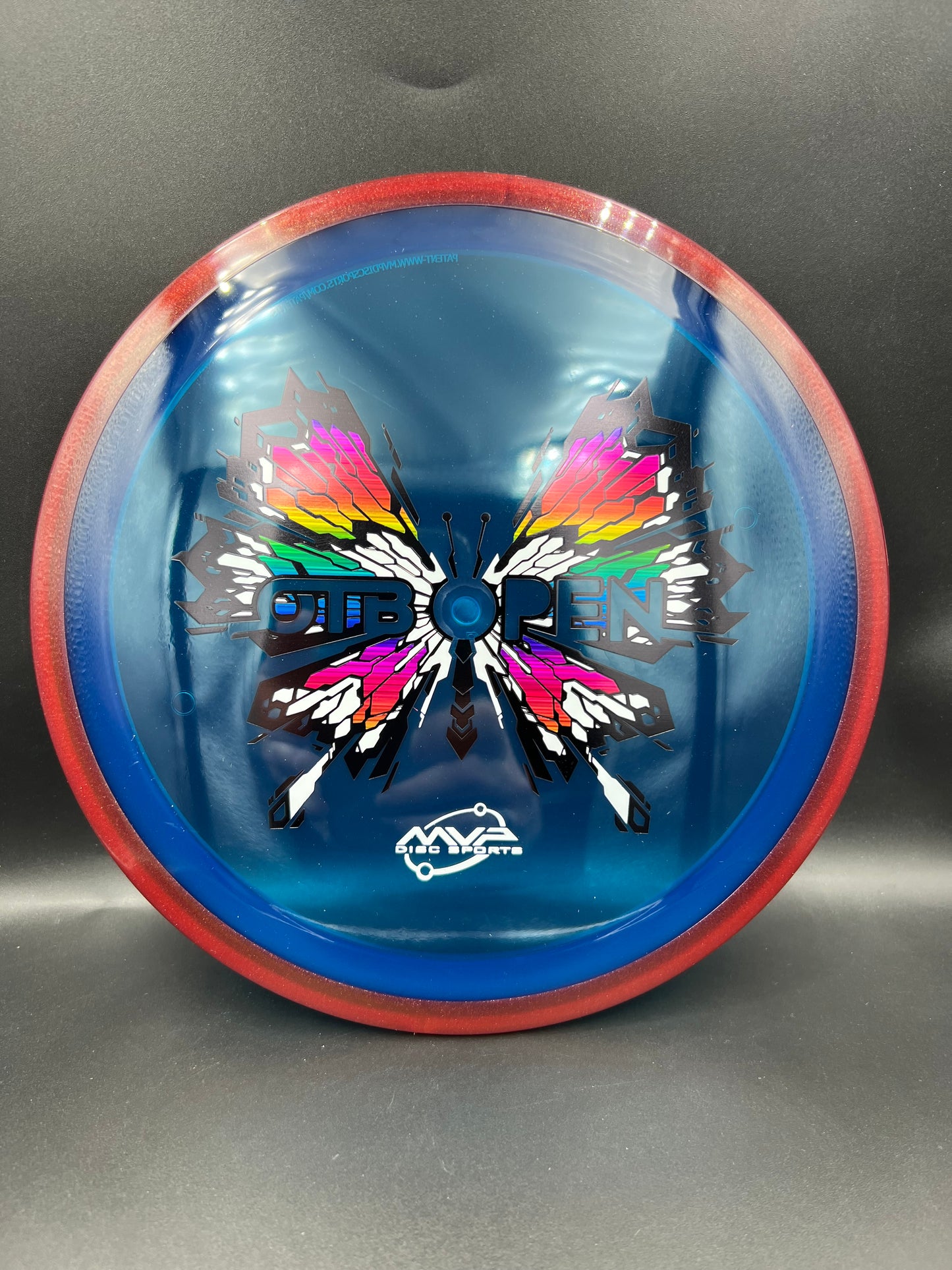 2026 OTB Axiom Prism Proton Soft Insanity Maroon Rim Blue Plate - 156g